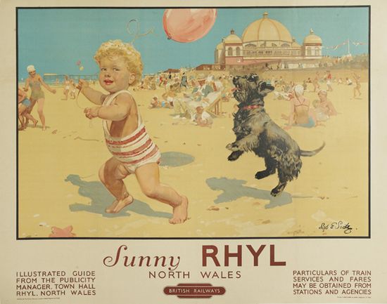 Sunny Rhyl North Wales, child and dog on the beach