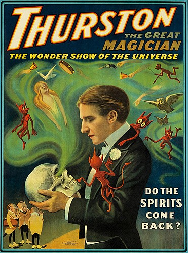 Thurston The Great Magician, man in suit, skeleton skull