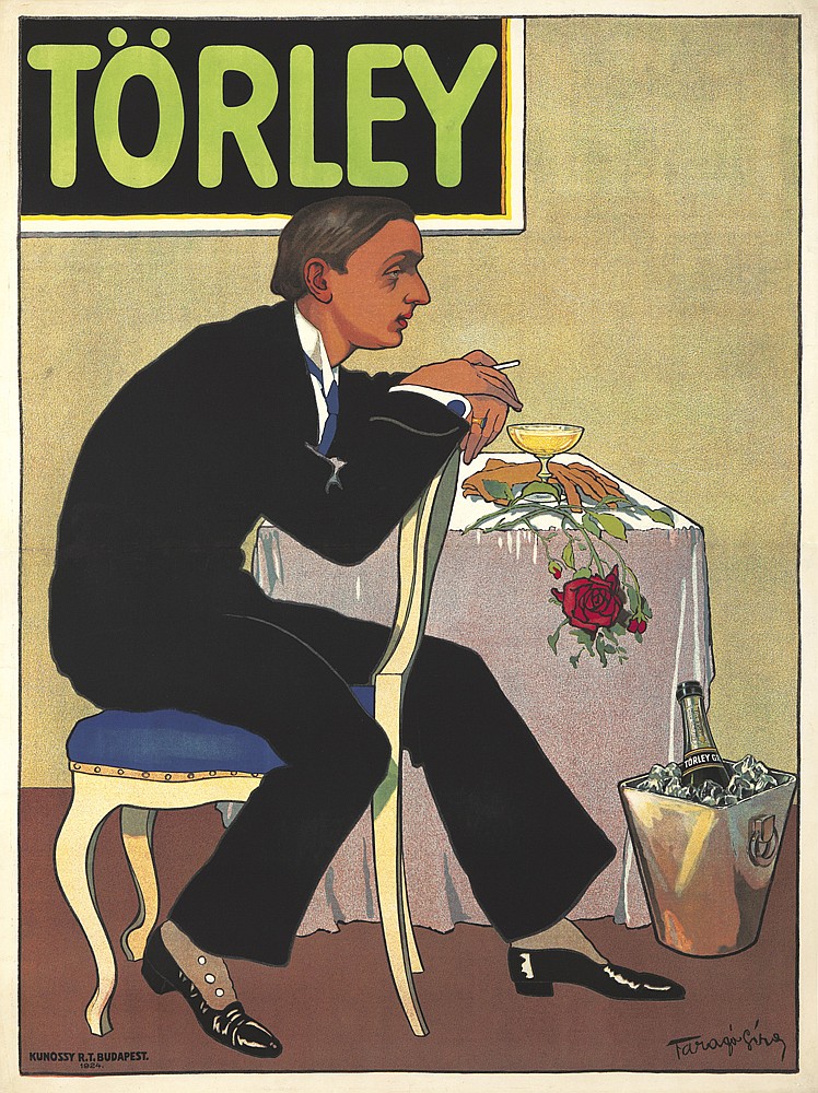 Torley, man in a suit at the table